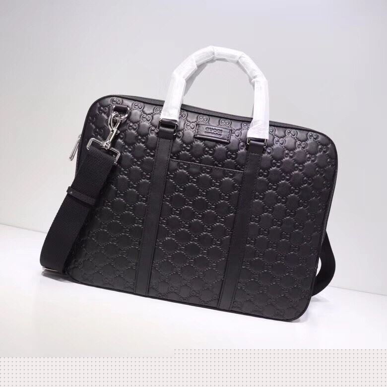 G*u*i top handle bags